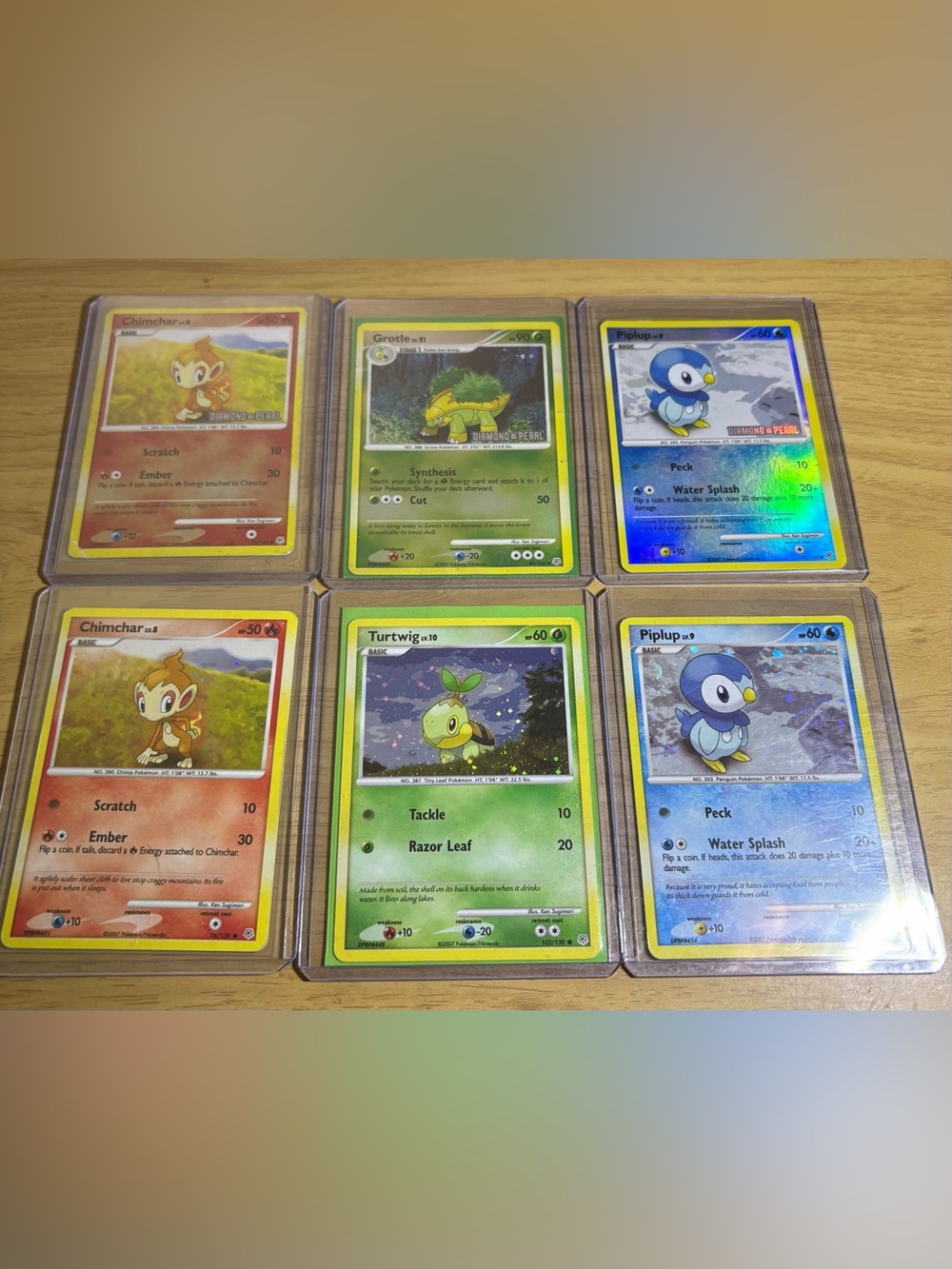 3 cosmos holo starter pokemon , 3 burger king stamped  - Green Holo Trainer Card